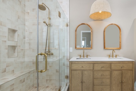 The primary bathroom has been beautifully renovated
