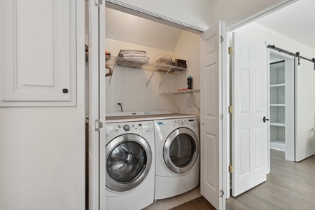 Your washer and dryer are just off the kitchen
