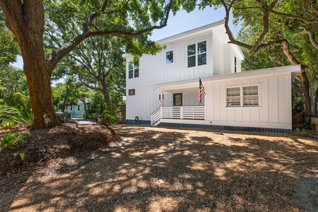 Your driveway is shaded by mature oak trees