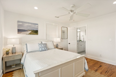 Your main level queen bedroom features an en suite bathroom