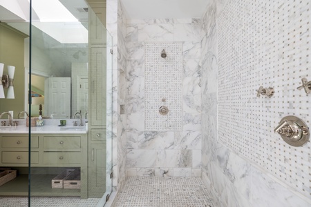 Step into your spa-like shower with elegant tilework