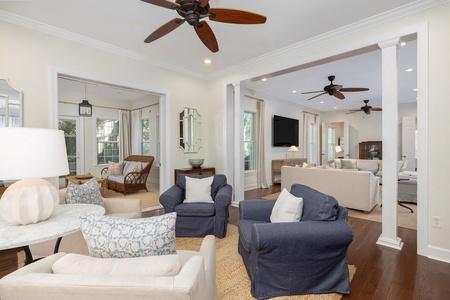 Unwind in your elegant sitting room with a cozy fireplace, perfect for relaxing evenings together.