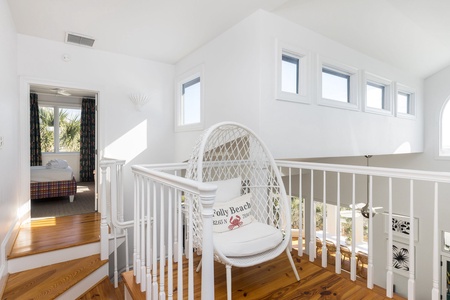 Seashell's Folly is full of character and this egg chair overlooking the living room is no exception