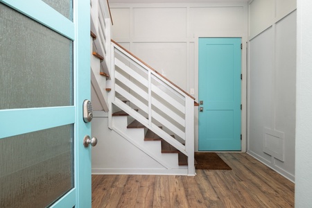 Step into your ground floor where you'll find the staircase that takes you to your main level
