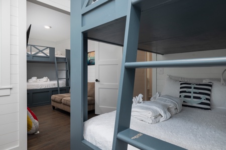 Two queen bunk beds provides tons of sleeping space for large families