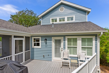 The outdoor deck is perfect for morning coffee or evening BBQs