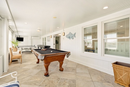 Challenge your family to a friendly game in your very own game room
