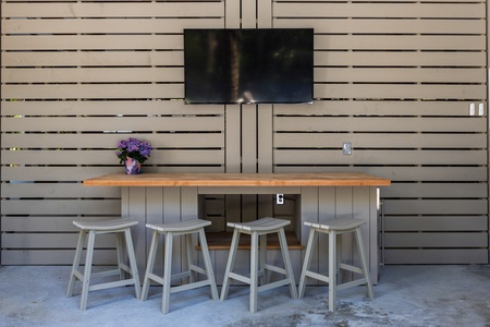 Below the back porch is your outdoor bar