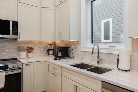 Your newly renovated kitchen features deep sinks