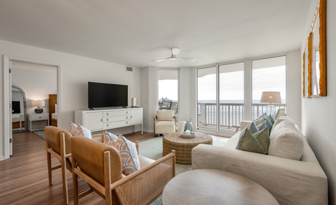 Unwind in your bright, contemporary living space with stunning water views through floor-to-ceiling windows.