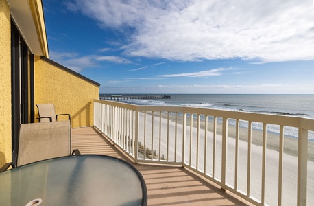Step onto your private oceanfront balcony where endless blue views and gentle sea breezes create the perfect coastal escape.