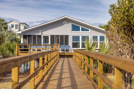 Welcome to Fun in the Sun, an oceanfront cottage with a private boardwalk to Folly Beach