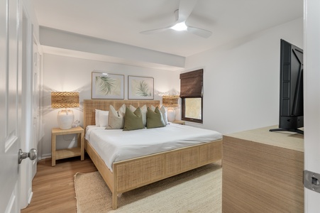 Sink into your peaceful retreat with natural textures, soft linens, and tropical touches creating the perfect sanctuary for rest.