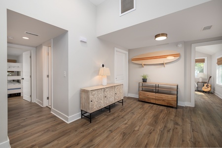 Access your bedrooms and bathrooms behind your kitchen