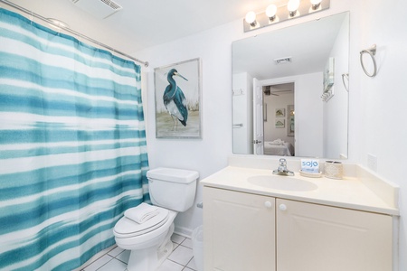 This bathroom offers a tub-shower combo
