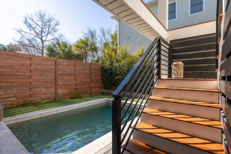 Take the steps down to your backyard oasis