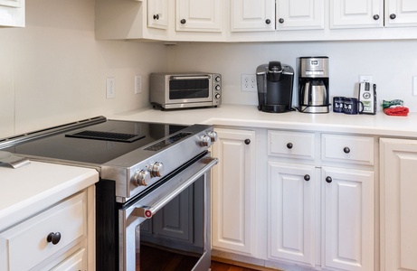 Your fully equipped kitchen features premium appliances and multiple ways to make your morning cup of coffee
