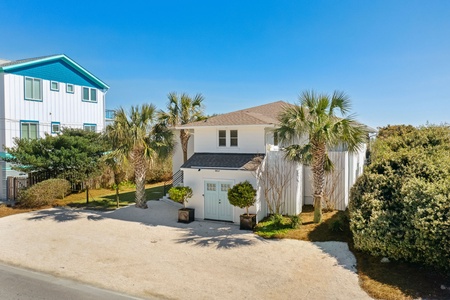 Tropical Front Exterior – Sunshine by the Sea welcomes you with classic Folly Beach style.