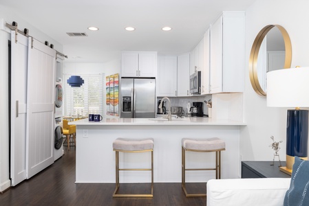 Your kitchen features bar top seating