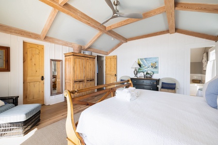 Sleep underneath soaring vaulted beams in your upstairs king room