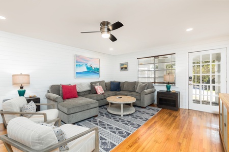 The spacious living room is located on the second floor
