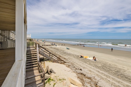 From the deck, take the stairs directly down to the sand
