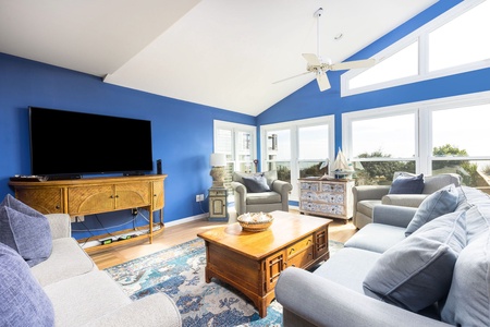 Your living room has plenty of natural light from the high windows