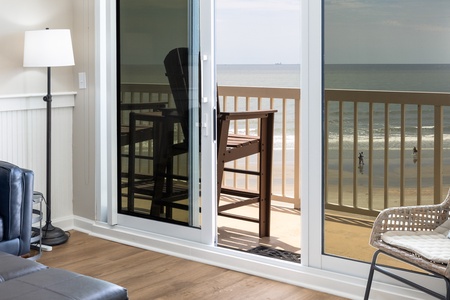 The glass sliding doors take you to your private balcony