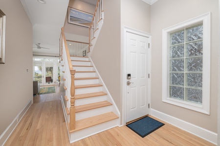 Enter to this beautiful, light wood staircase