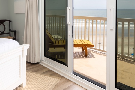 Step out onto your private balcony directly from your primary bedroom
