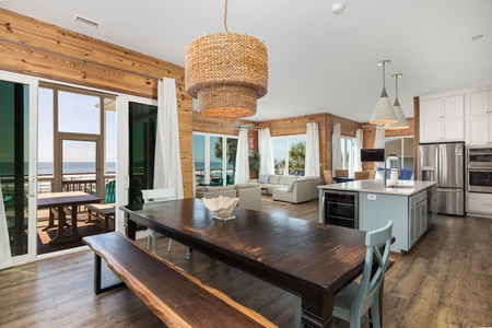 Your dining room features an indoor table and sliding doors to your screened-in outdoor dining