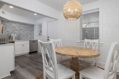 A breakfast nook and separate kitchen are included in the downstairs living space