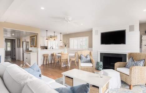 The living and dining area flows into the kitchen, and the ocean view can be enjoyed from everywhere.