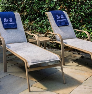 Plenty of lounge chairs for poolside relaxing