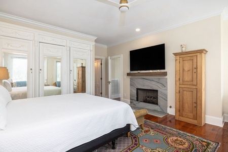 Your fourth king bedroom features a fireplace and en suite bathroom