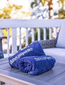 The beach is just a short stroll down the private neighborhood path.