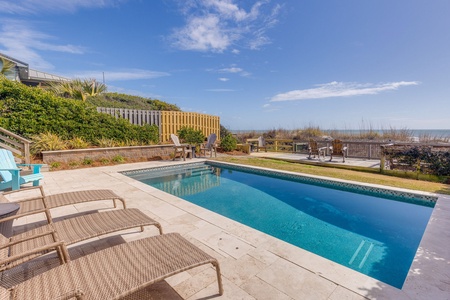 Enjoy a sparkling pool just steps from the sand