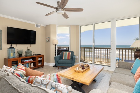Relax in your bright living room with the sounds of the ocean