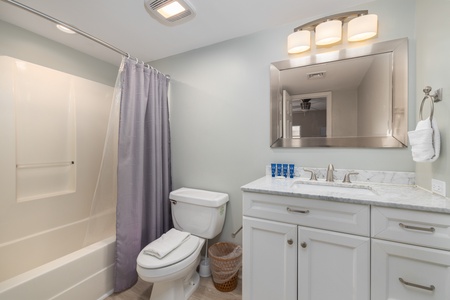 Your queen en suite includes a tub-shower combo