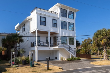 Welcome to Beach Babe, your modern three-story beach house just steps from the sand