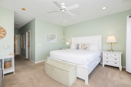 Your primary bedroom features a king size bed and en suite bathroom