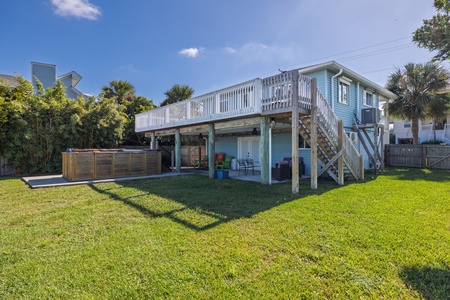 On Beach Time has a large grassy backyard