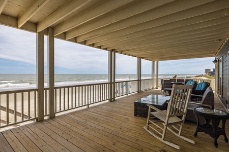 Relax in your rocking chairs and take in the sounds of the ocean