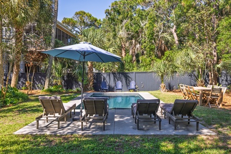 Lounge in these comfortable chairs next to your pool