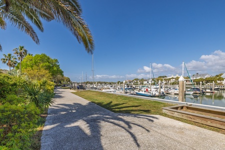 Take a walk on the dock and admire the boats at The Moorings private marina.