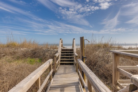Your private boardwalk features an outdoor shower for rinsing off
