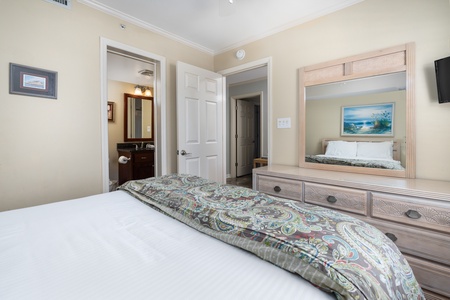 The queen bedroom features an en suite bathroom