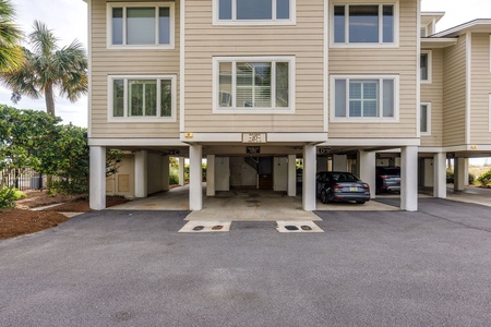 Covered parking garage is located under the building.