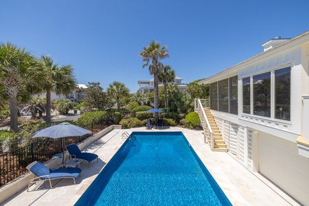 Your outdoor dining area overlooks your private pool