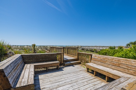 Halfway down your private boardwalk is a place to sit back and relax